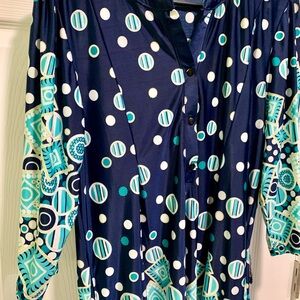 Long ( push up) sleeve very comfortable mini dress. Geometric dotted design.